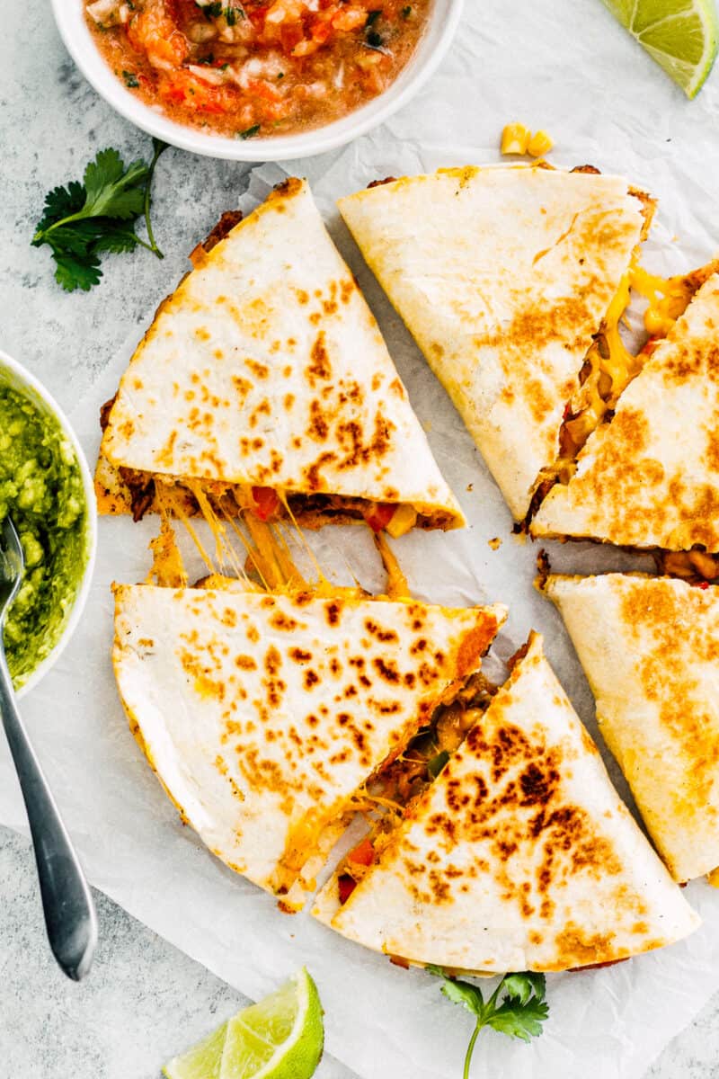 overhead image of chicken quesadilla on parchment