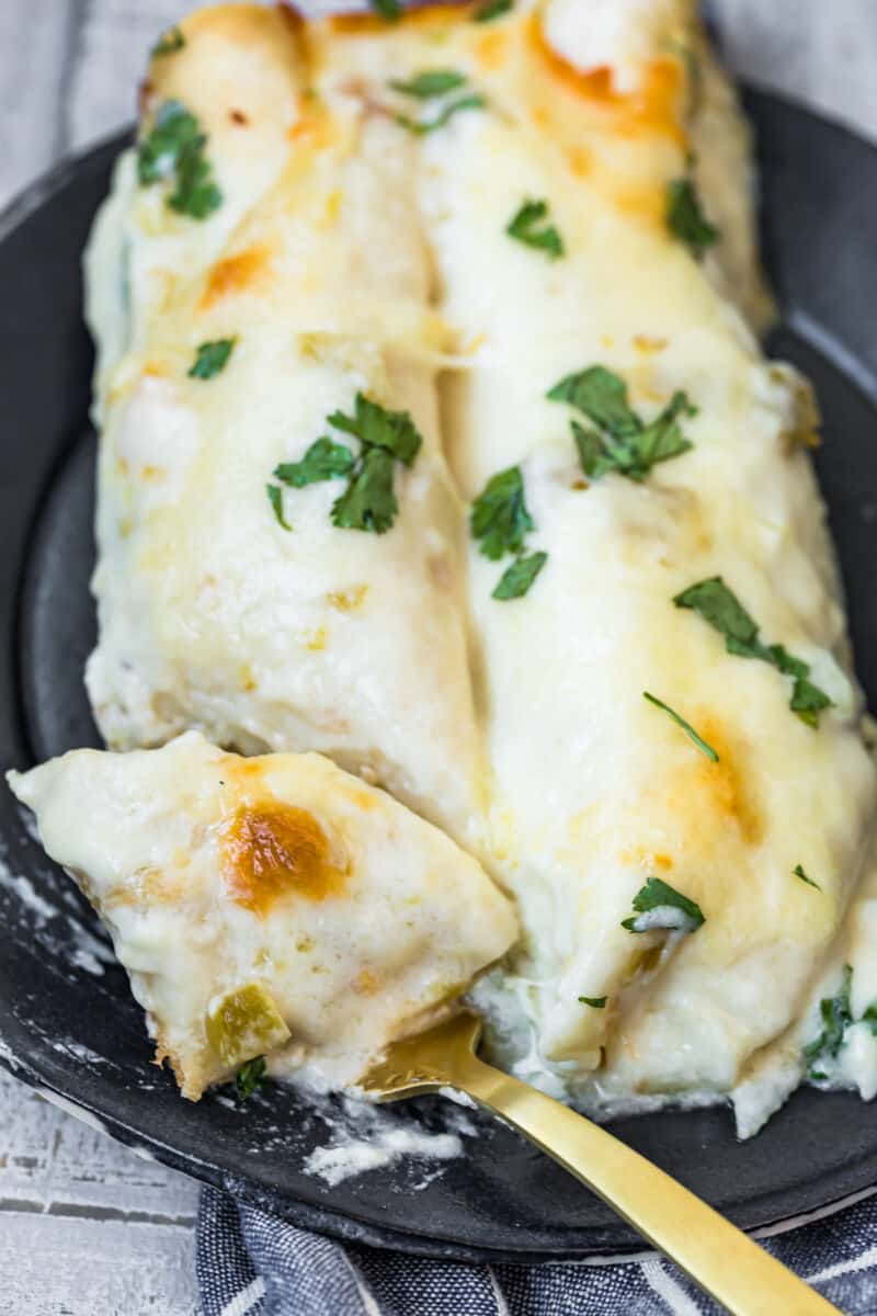 overhead image of green chile chicken enchiladas on plate