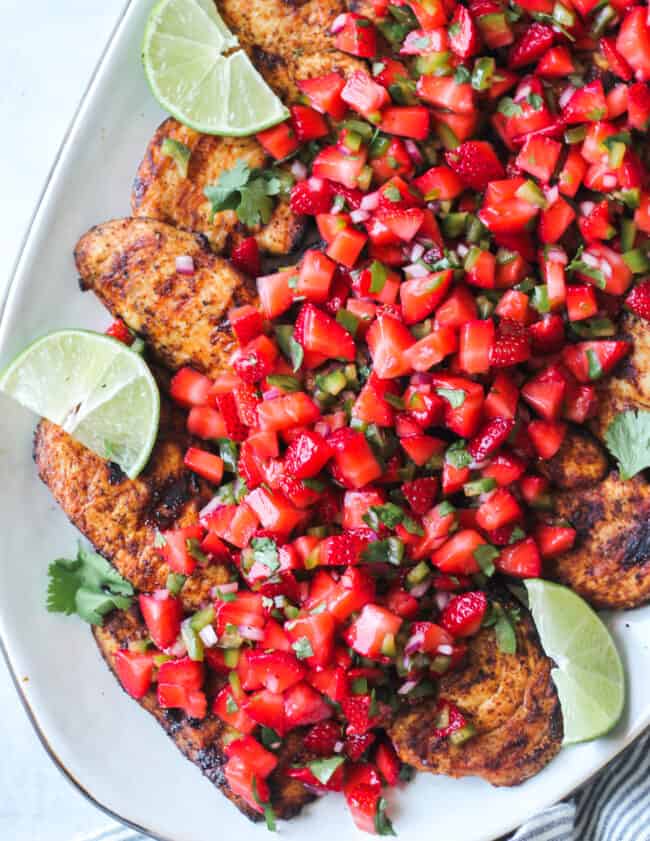 grilled chicken topped with strawberry salsa