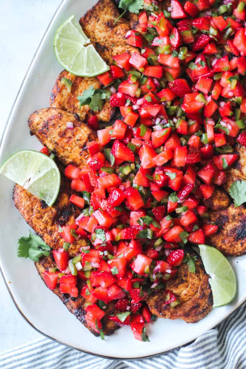 grilled chicken topped with strawberry salsa