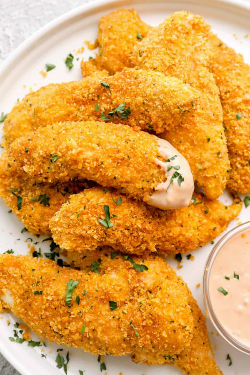 chicken strips dipped in sauce