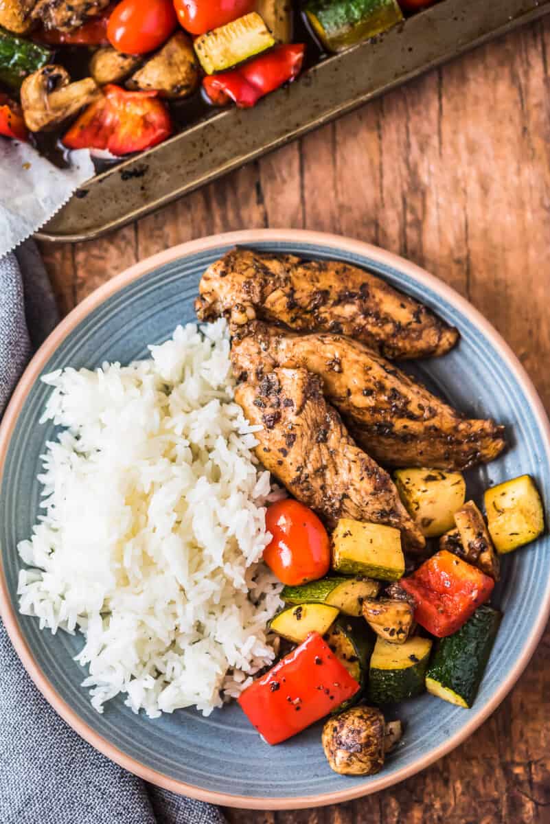 plated balsamic chicken with vegetables and rice