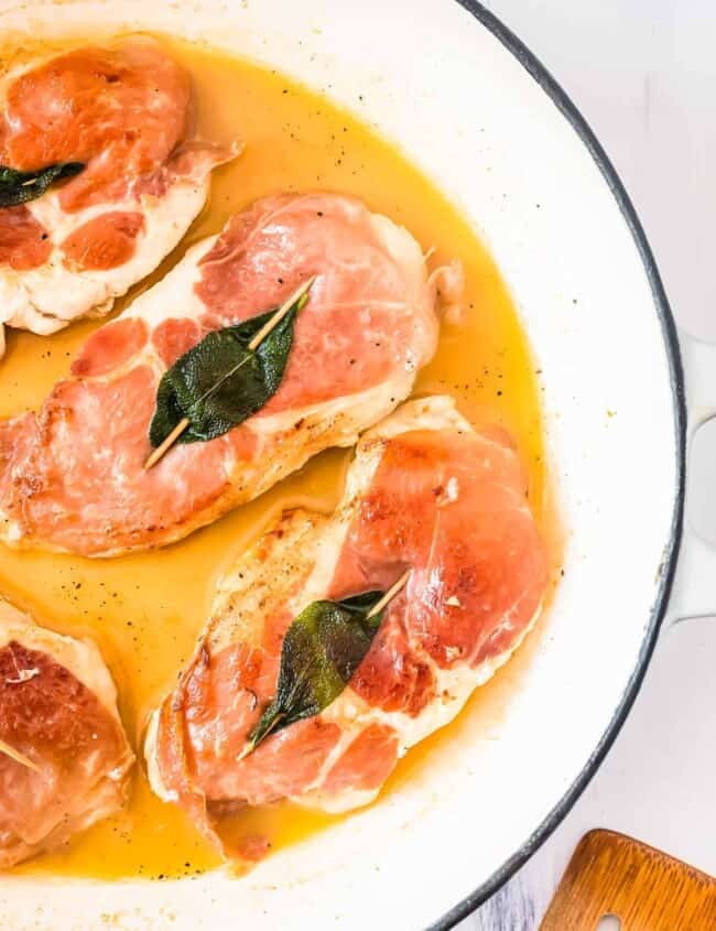 up close overhead image of chicken saltimbocca in stock pot