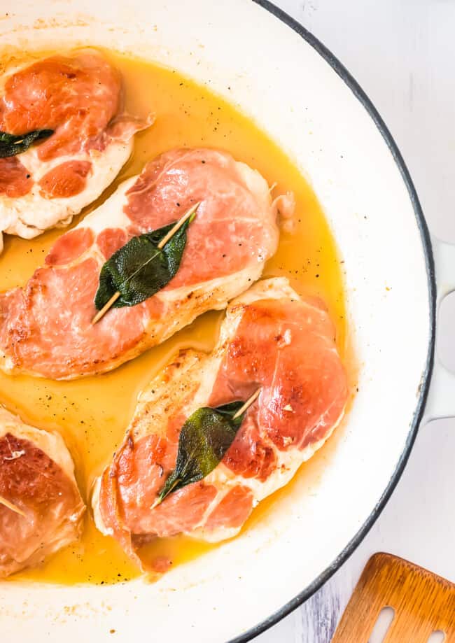 up close overhead image of chicken saltimbocca in stock pot