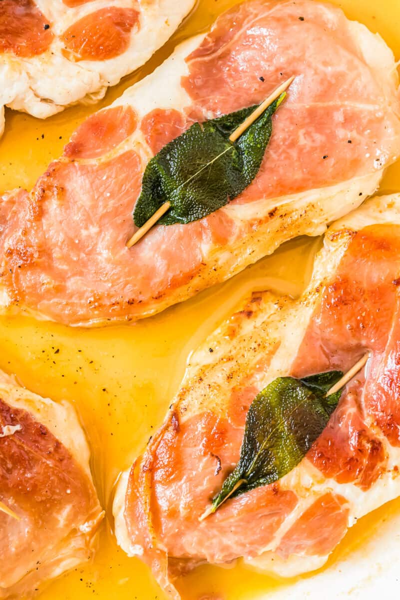 up close overhead image of chicken saltimbocca in stock pot