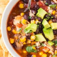 up close image of chicken chili with avocado