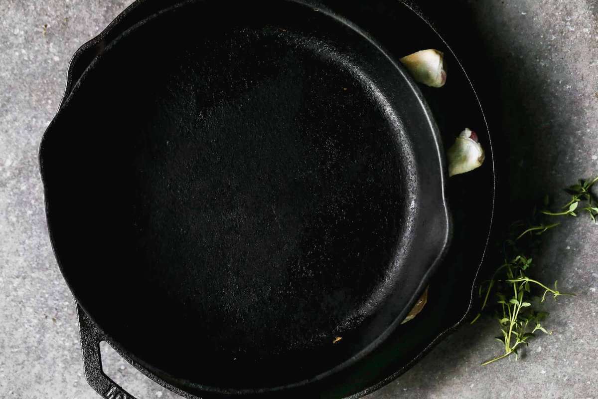 skillet flattening chicken