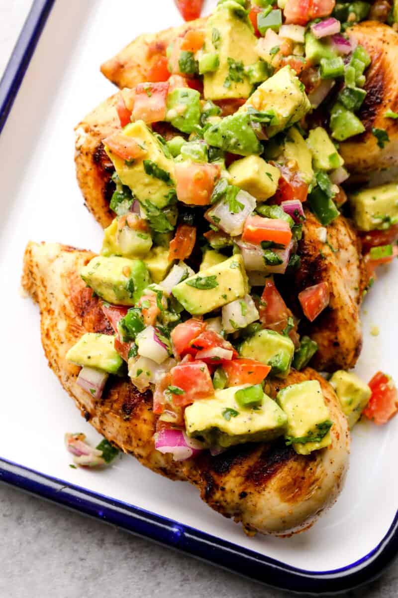 grilled chicken topped with avocado salsa