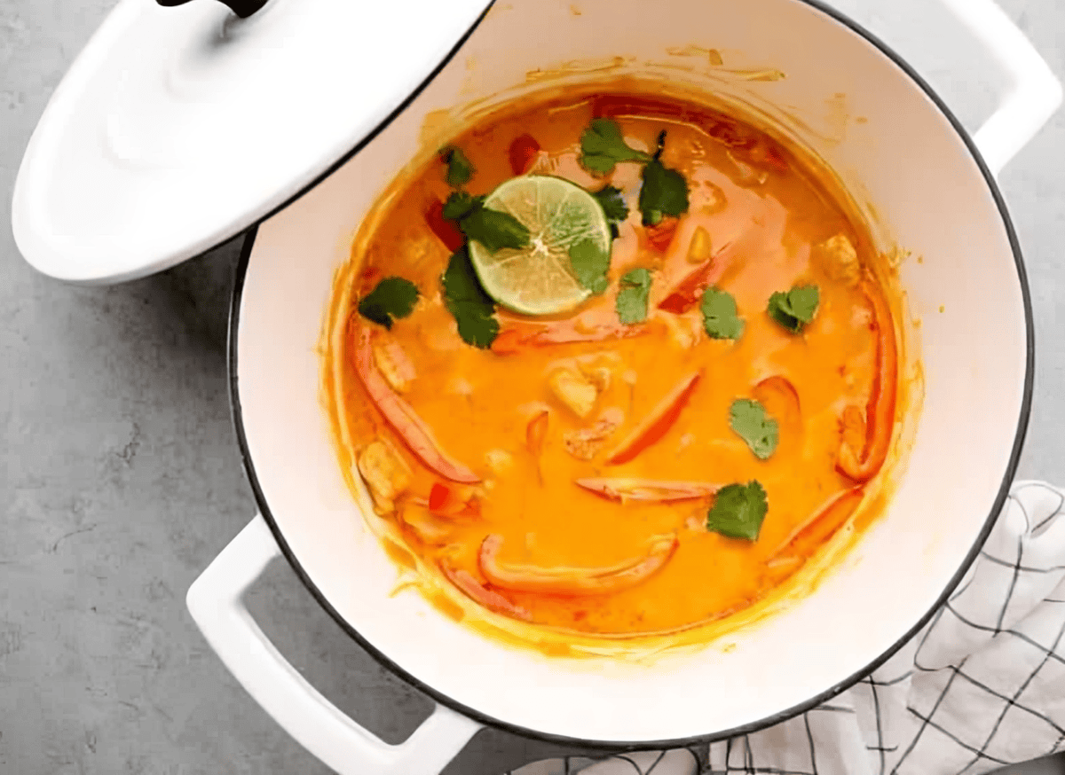 thai red curry chicken in a dutch oven.