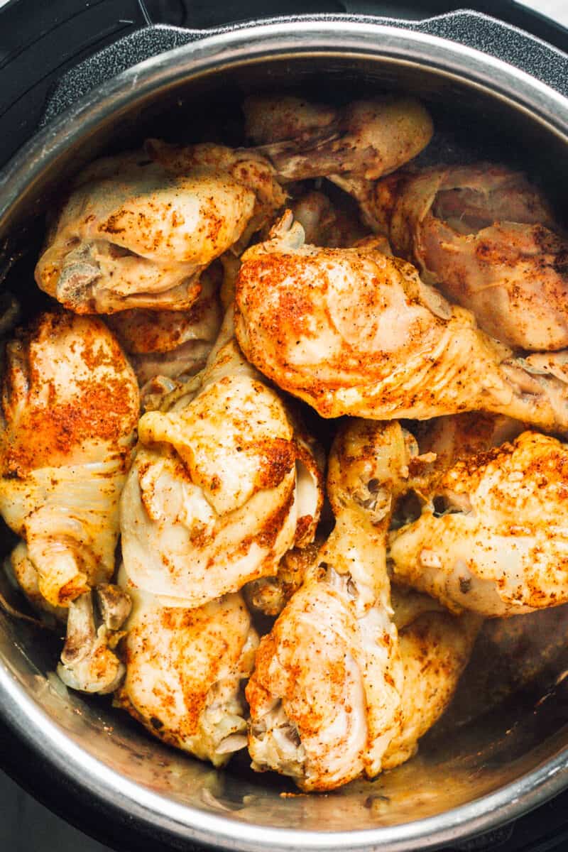 up close image of spiced chicken legs in instant pot