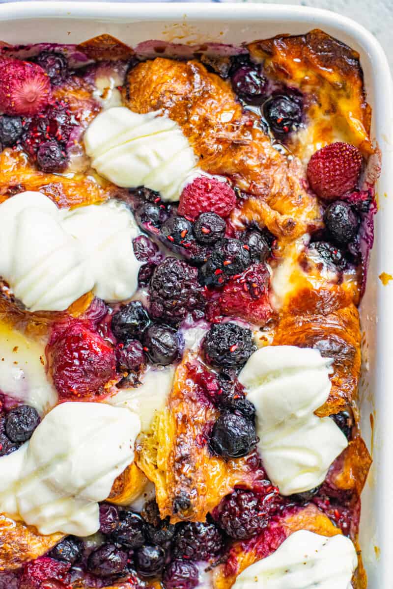 croissant french toast bake with berries and cream