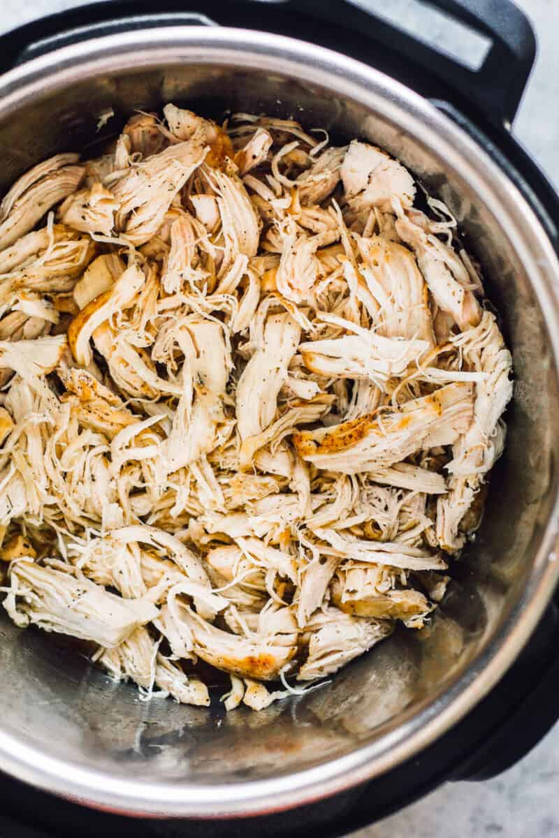 Shredded chicken prepared quickly using an instant pot.