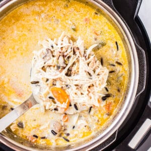 ladle of chicken wild rice soup in instant pot