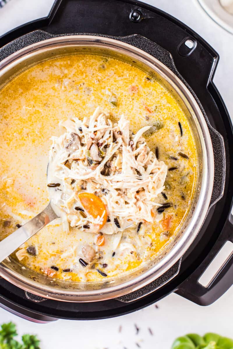 ladle of chicken wild rice soup in instant pot