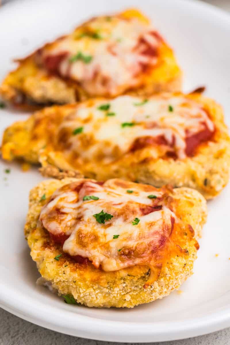 air fried chicken parmesan with cheese on platter