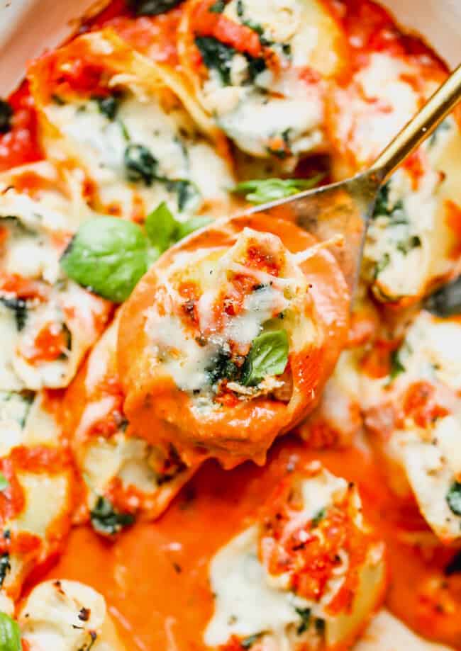 lifting up spinach chicken stuffed shells