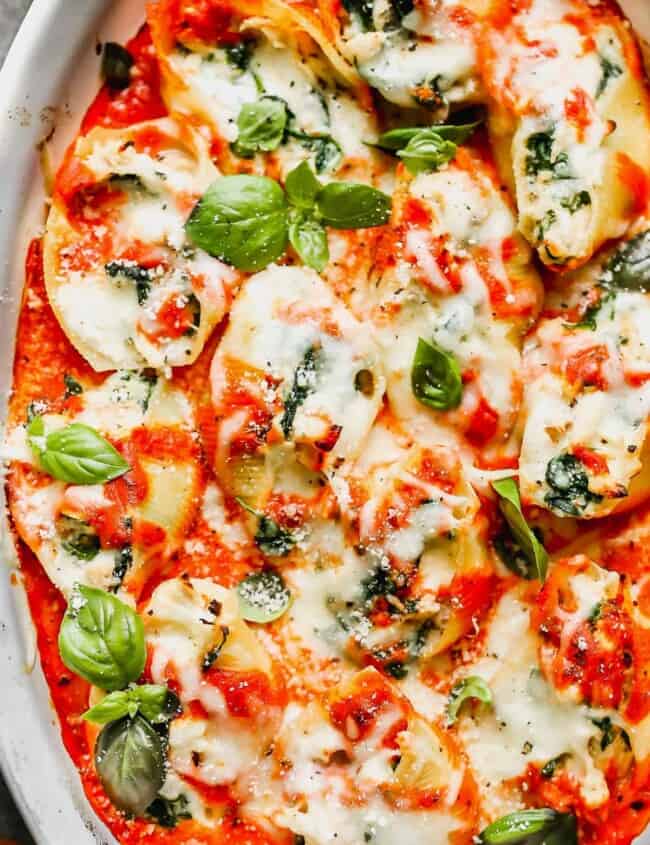 baked chicken stuffed shells in baking dish