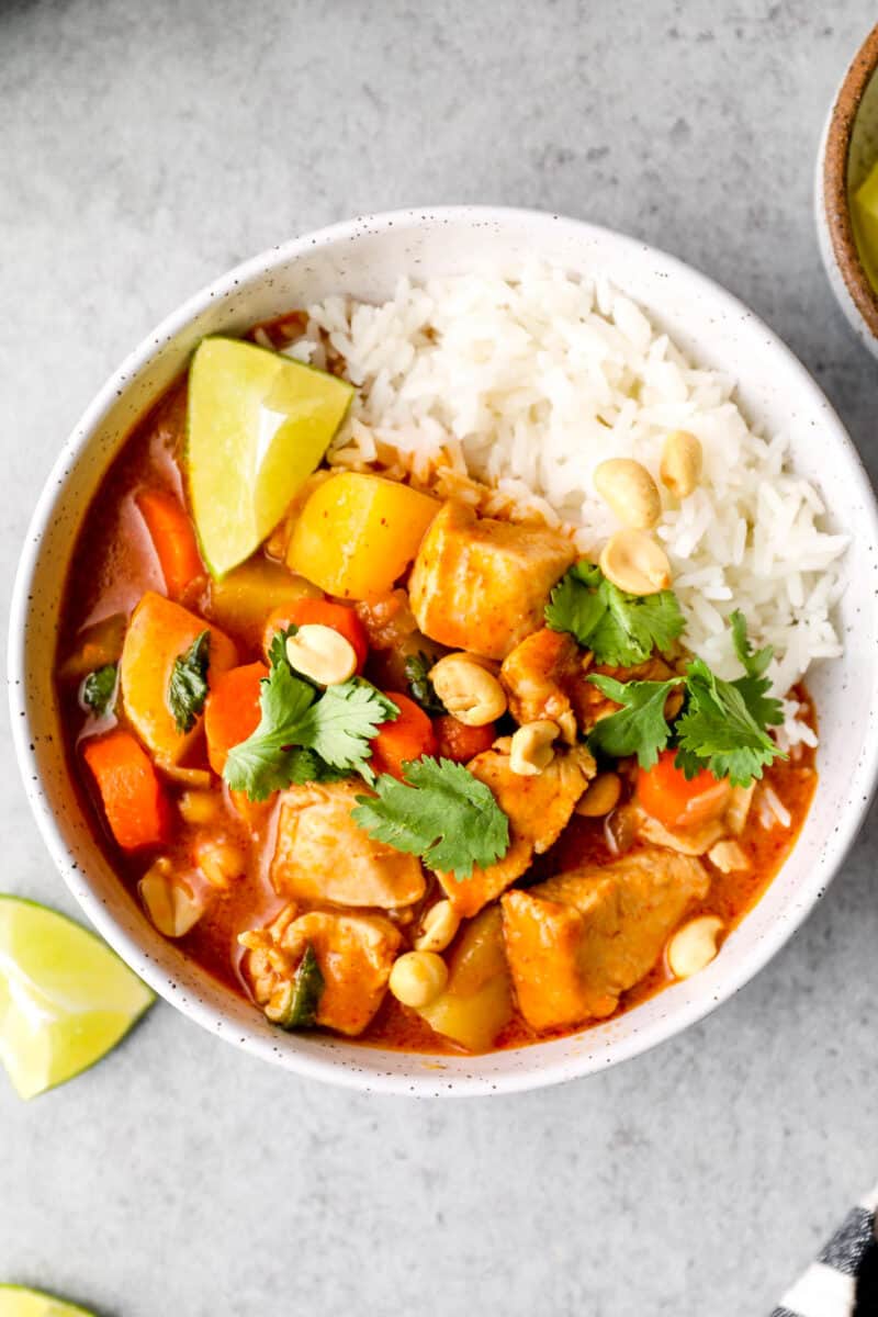up close image of chicken massaman curry with white rice