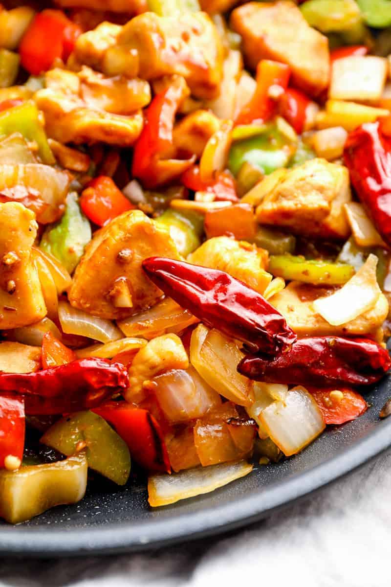 up close image of spicy chicken with peppers