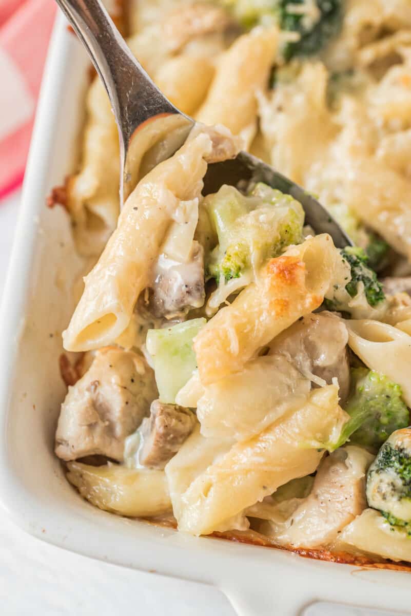 chicken and broccoli pasta bake with serving spoon