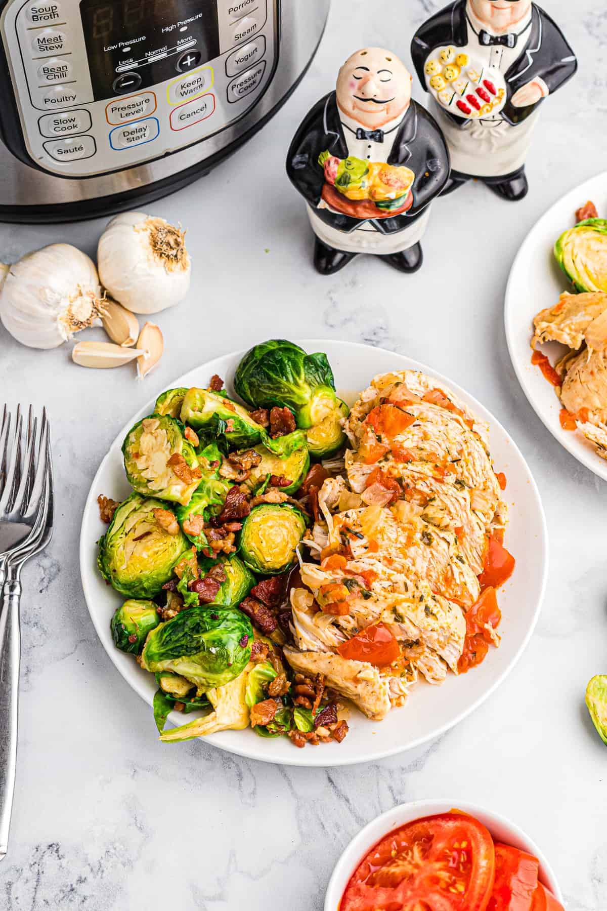 instant pot balsamic chicken with brussels sprouts on plate