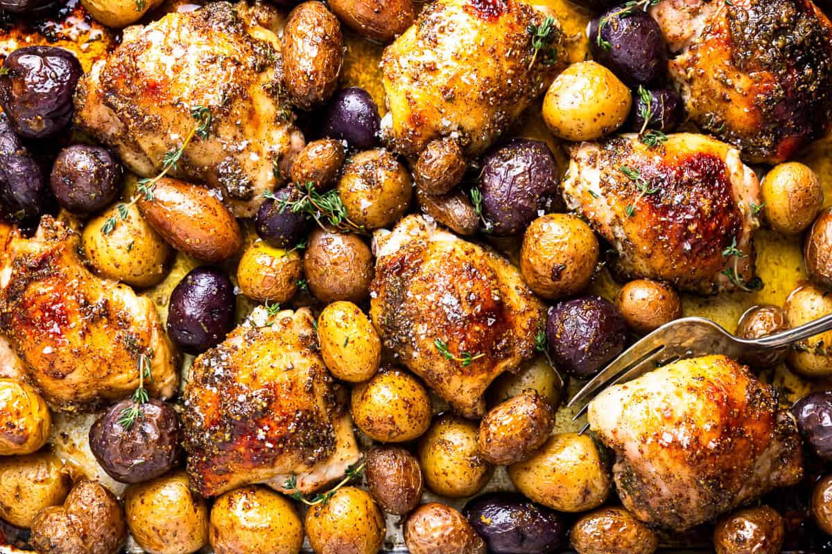 baked honey mustard chicken thighs and potatoes.