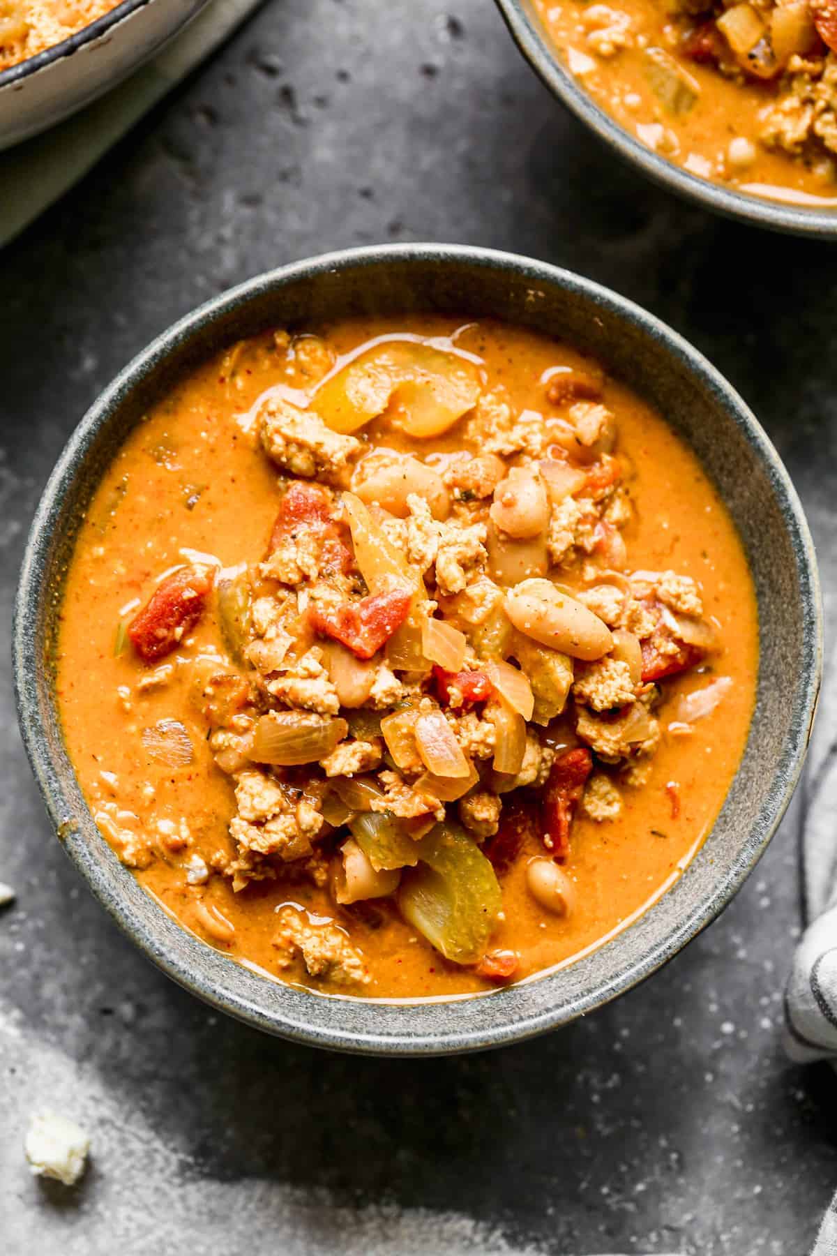 creamy white beans buffalo chicken chili in bowls