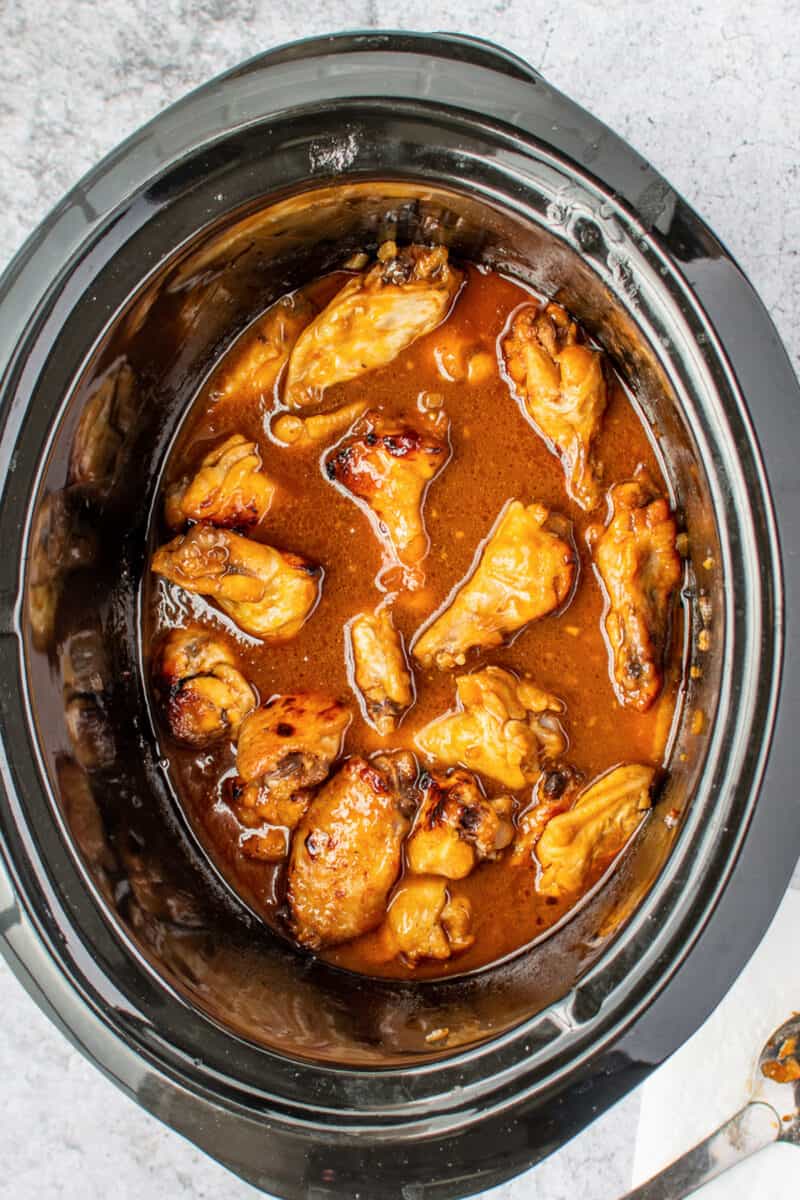 crockpot honey bourbon chicken wings in slow cooker