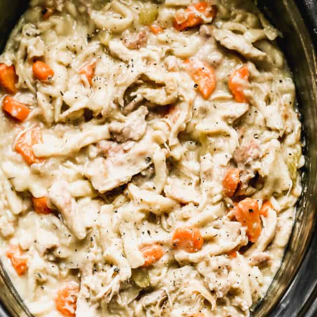 up close image of crockpot chicken and noodles