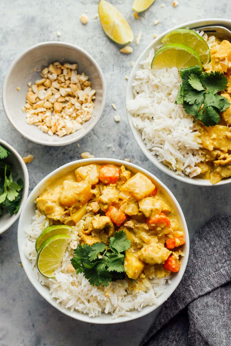 crockpot chicken curry in bowls with rice