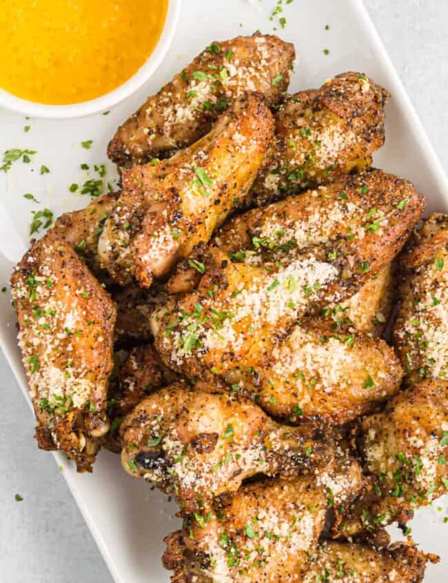 garlic parmesan wings on platter