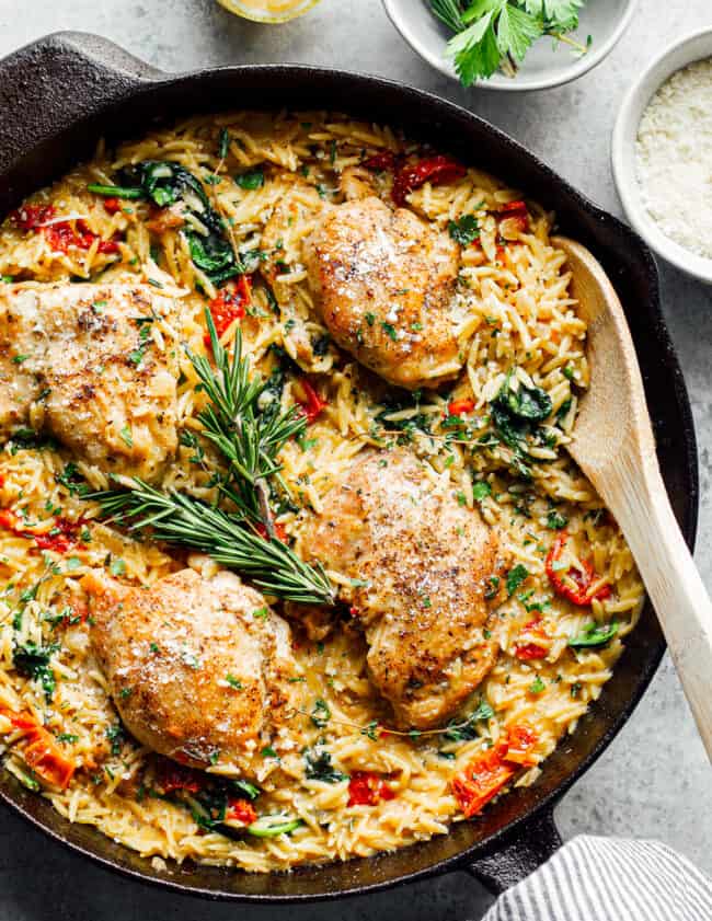 tuscan chicken or orzo in black skillet