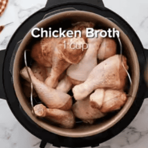 Chicken drumsticks are placed in an Instant Pot.