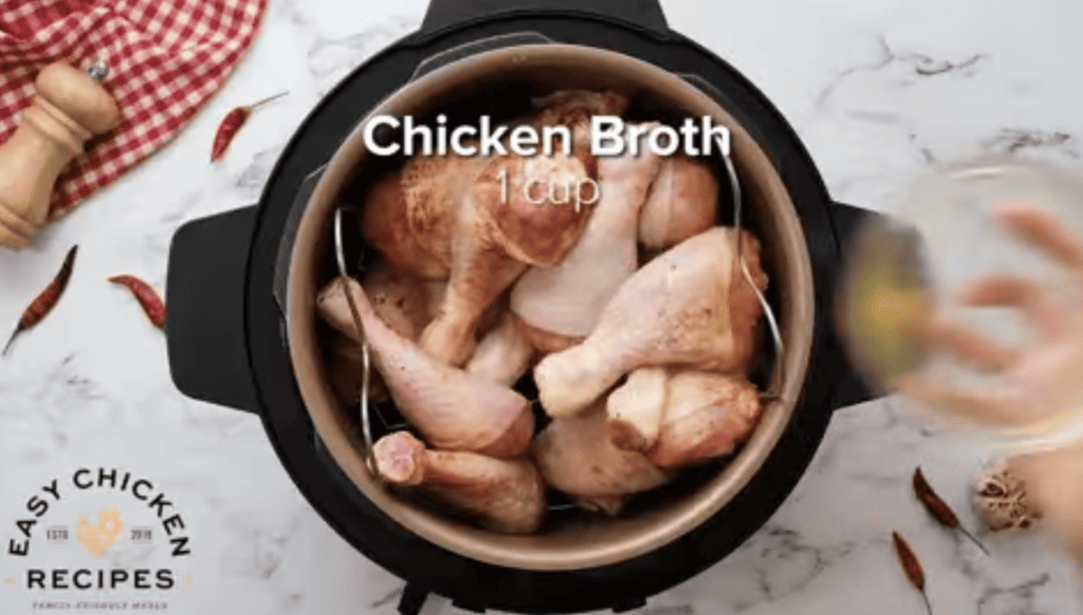 Chicken drumsticks are placed in an Instant Pot.