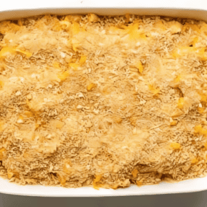 Chicken macaroni and cheese casserole topped with breadcrumbs.