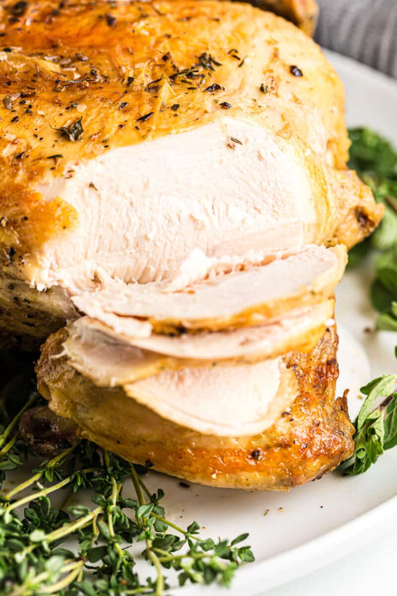 slicing into air fryer whole chicken