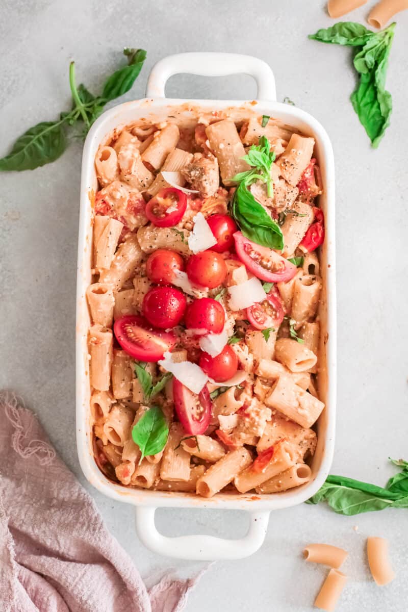 baking dish filled with chicken baked feta pasta