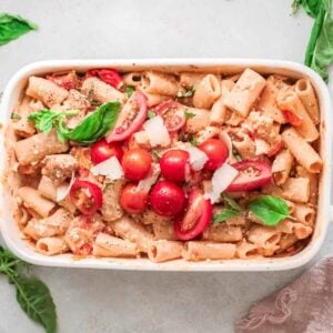 baking dish filled with chicken baked feta pasta