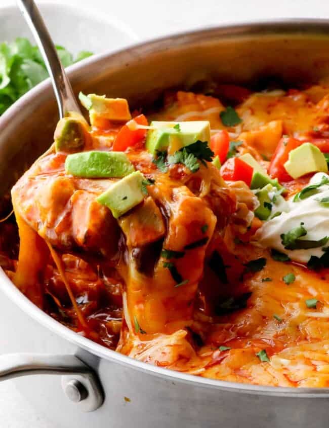 cheesy chicken enchilada skillet in pan