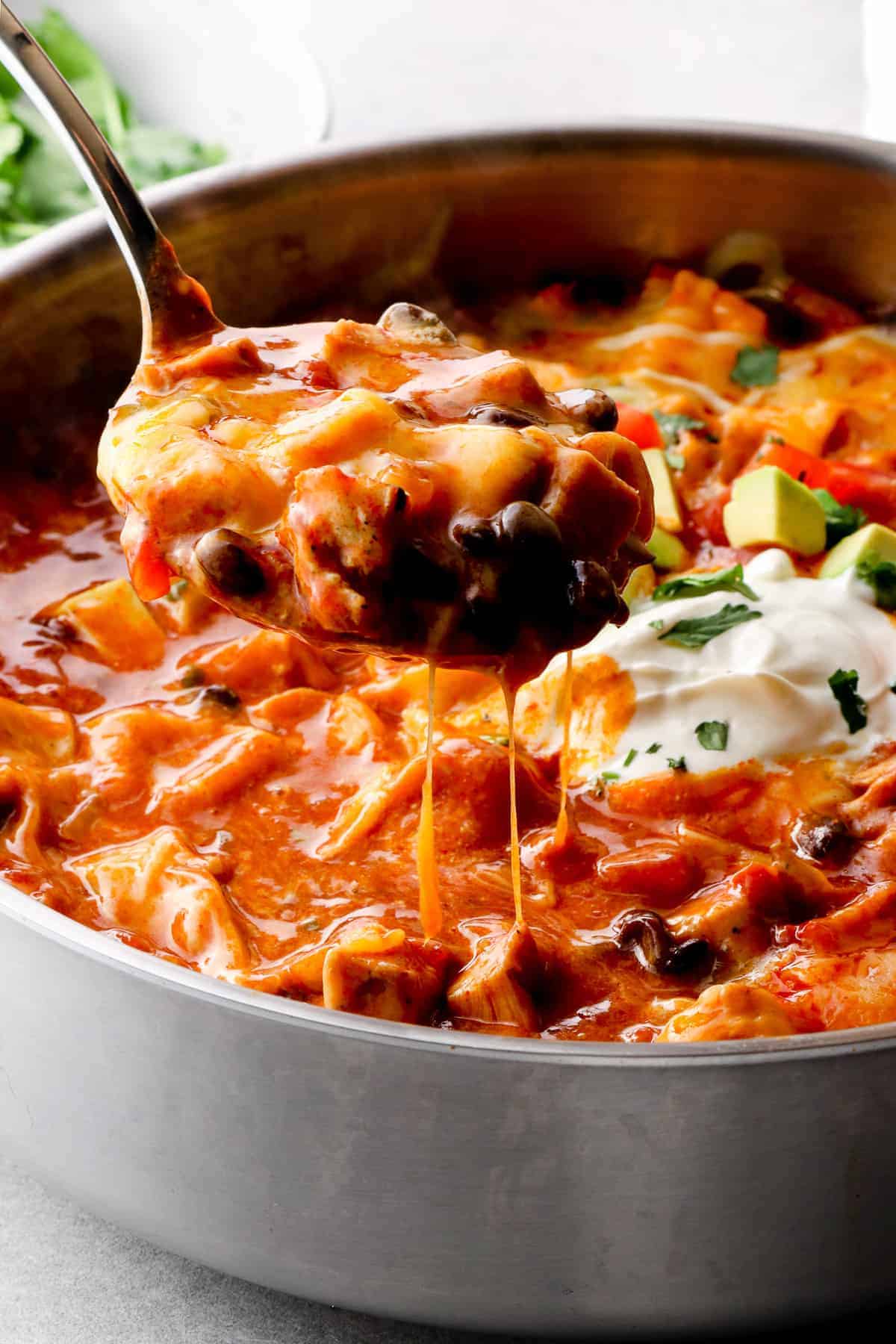 cheesy chicken enchilada skillet in pan