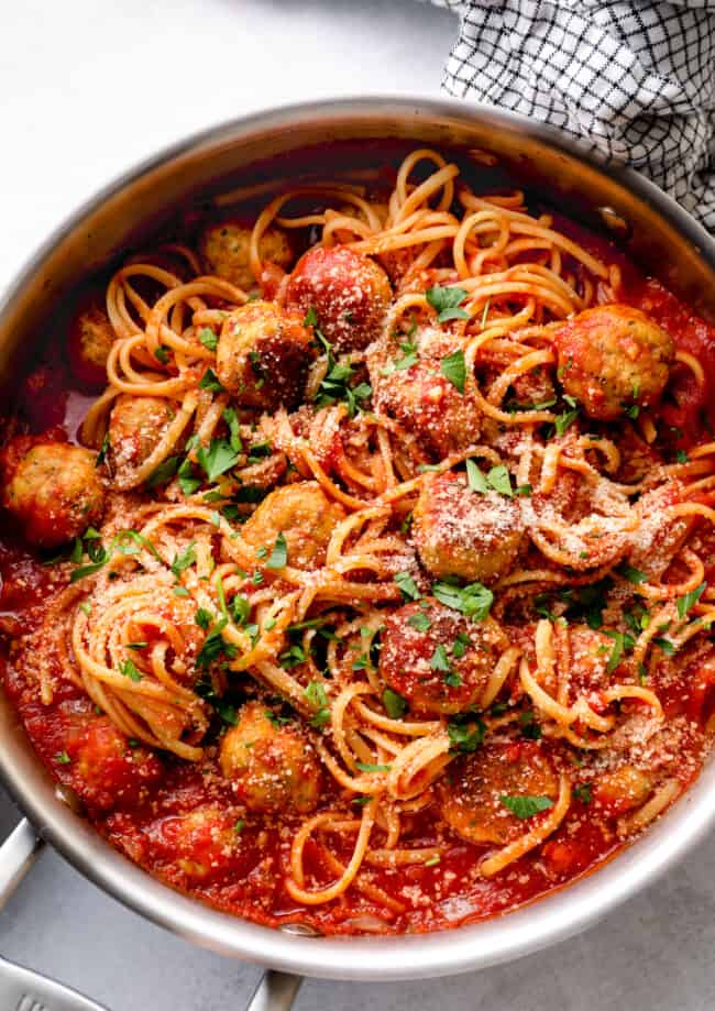 skillet with chicken spaghetti and meatballs