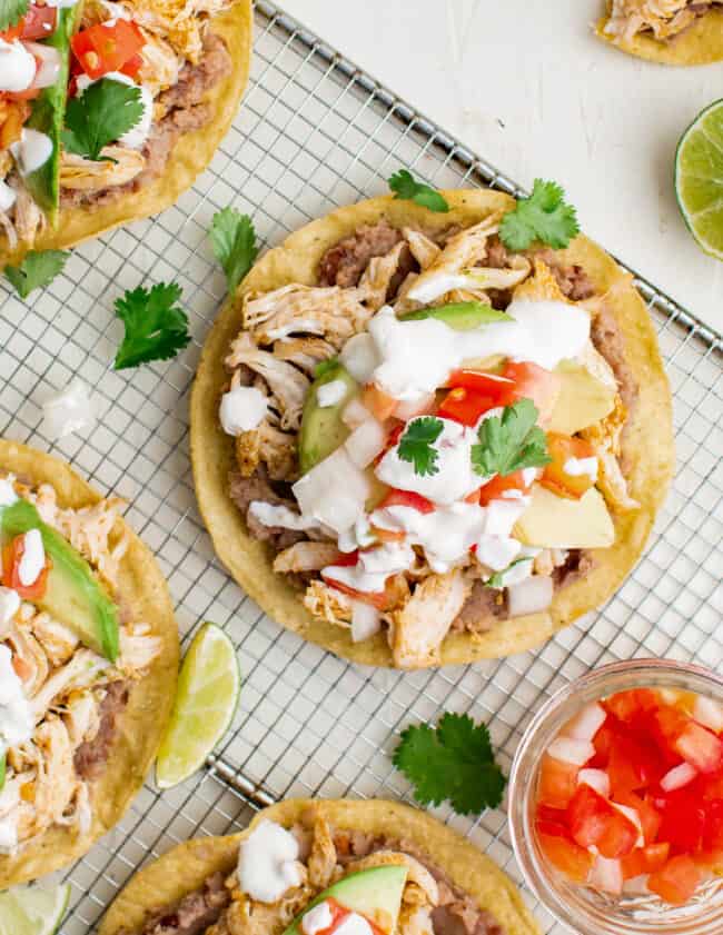 up close overhead image chicken tostadas on cooking rack