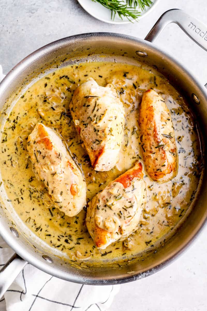 rosemary chicken with creamy sauce in skillet