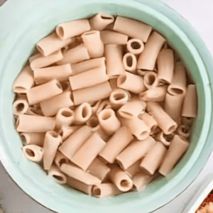 cooked and drained rigatoni pasta.