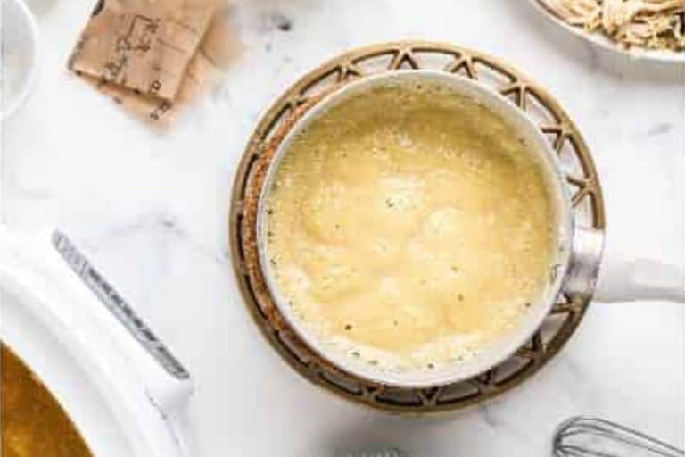 A roux bubbling in a saucepan.