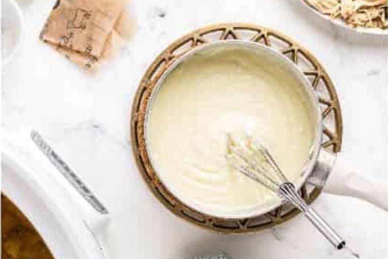 Butter mix in a saucepan for crockpot chicken wild rice soup.