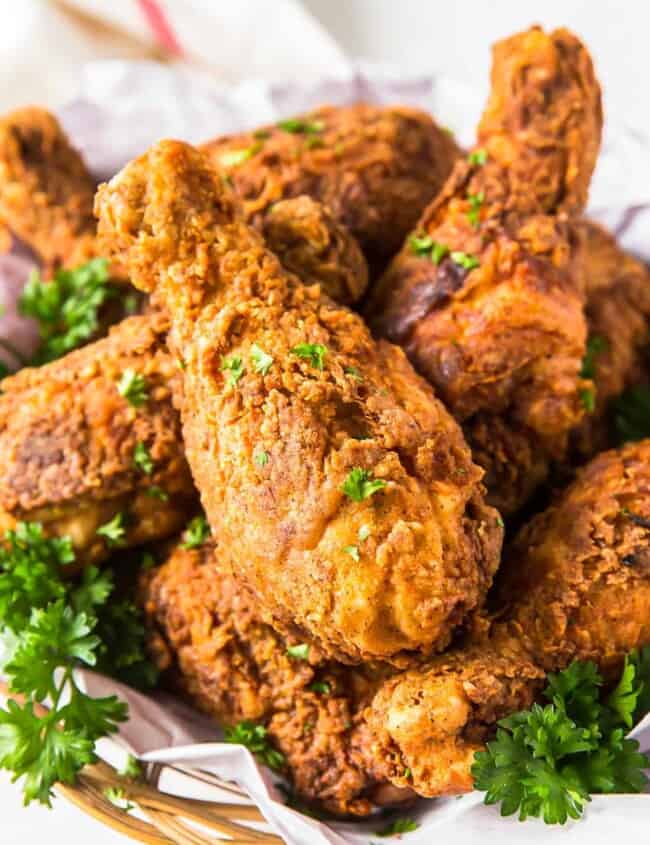 fried chicken drumsticks on platter