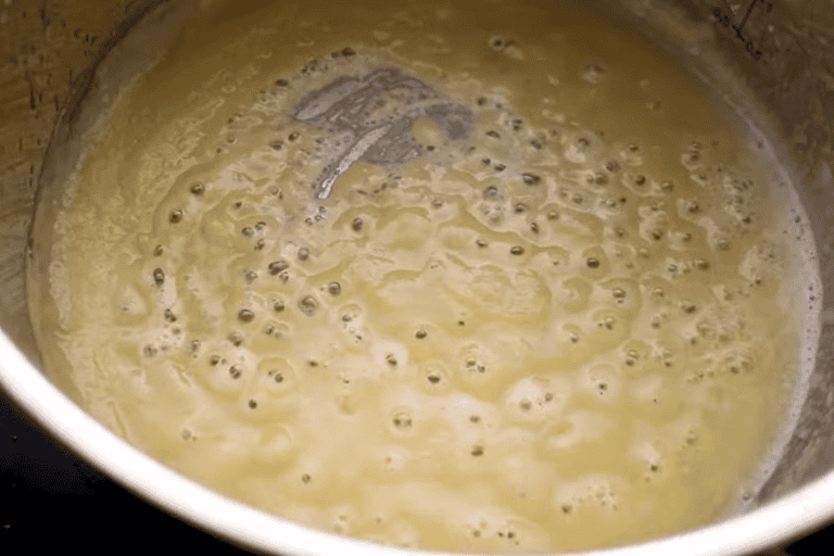 A roux bubbling in a pan.