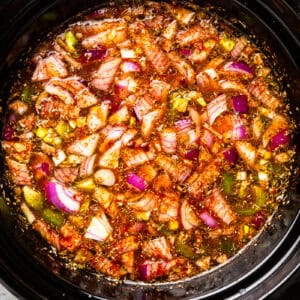 salsa and veggies in a crockpot.