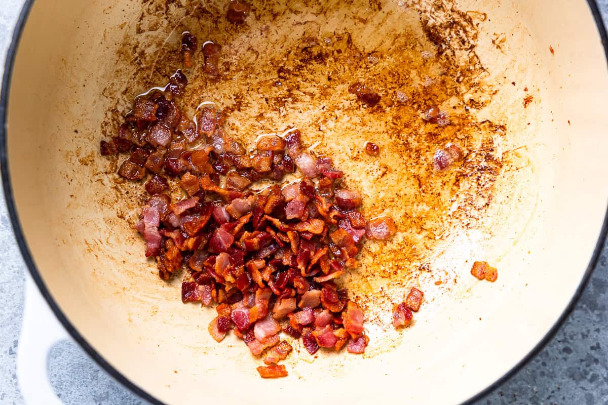 cooked chopped bacon in a dutch oven.